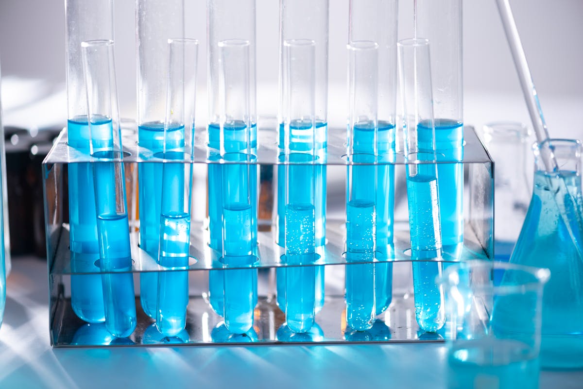 Test tubes and lab glassware on a research bench